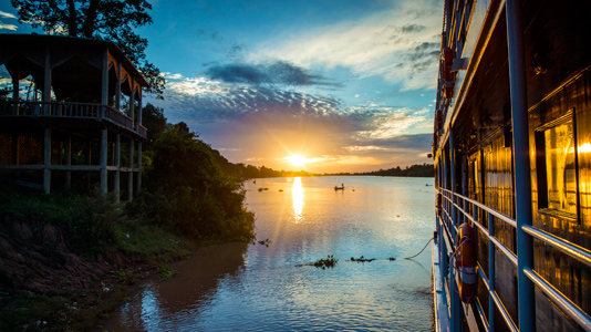 Sonnenaufgang über dem Mekong © G Adventures